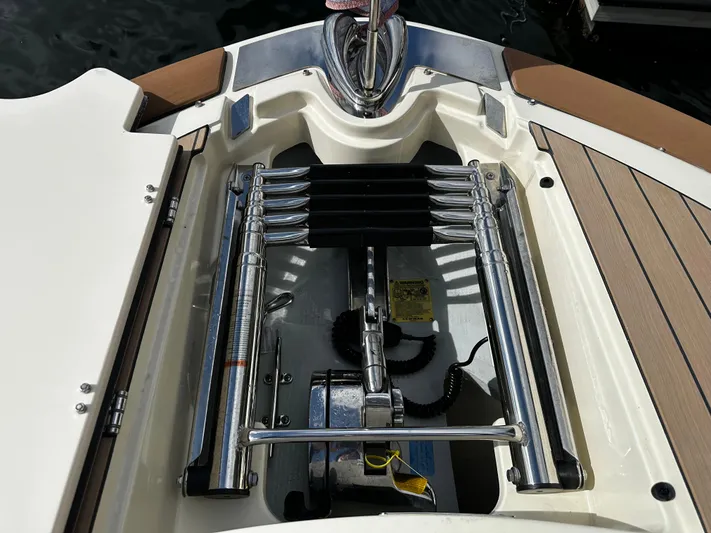  Yacht Photos Pics 2023 Chris-Craft Launch 31 GT boat anchor compartment with polished metal fittings.