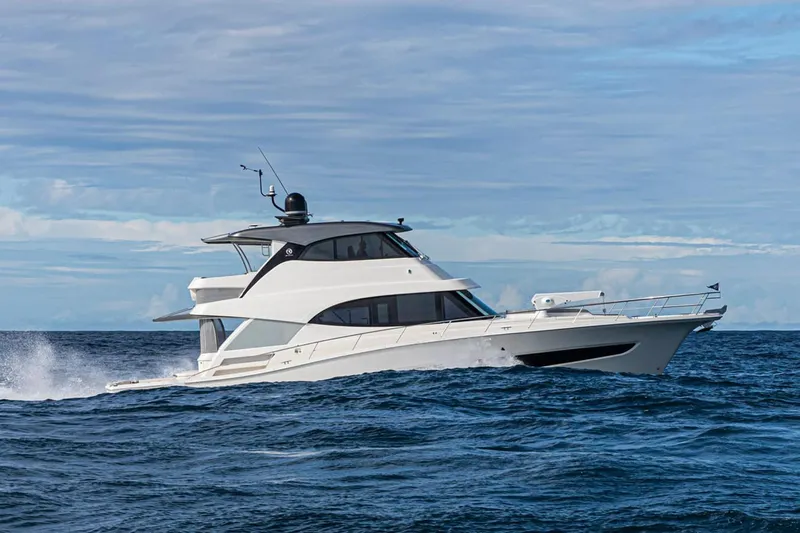  Yacht Photos Pics Manufacturer Provided Image: 2021 Riviera 64 Sports Motor Yacht cruising on open sea.