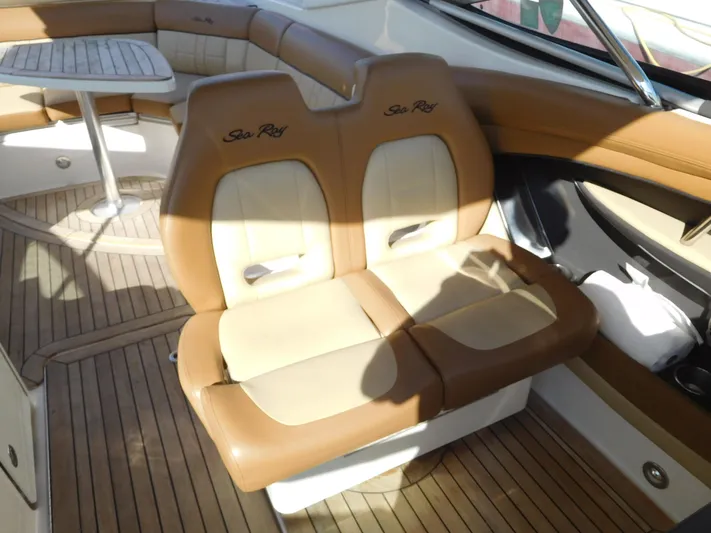  Yacht Photos Pics 2015 Sea Ray 350 SLX interior with tan leather seats and wooden flooring.