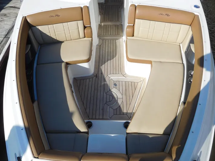  Yacht Photos Pics 2015 Sea Ray 350 SLX boat interior with tan leather seating and wooden flooring.