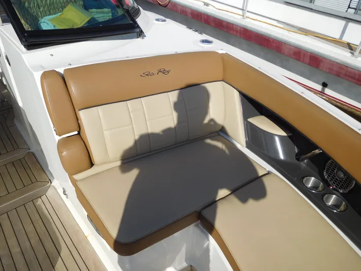  Yacht Photos Pics 2015 Sea Ray 350 SLX boat interior with tan leather seating and cup holders.