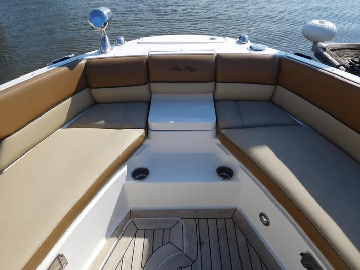  Yacht Photos Pics 2015 Sea Ray 350 SLX boat interior with tan seating and wood flooring.