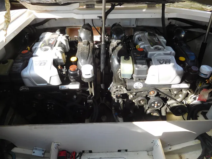  Yacht Photos Pics Twin engines of a 2015 Sea Ray 350 SLX boat, showcasing powerful V8 motors.