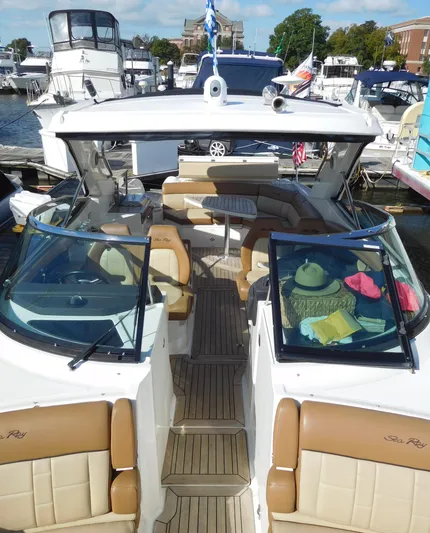  Yacht Photos Pics 2015 Sea Ray 350 SLX luxury boat docked at marina, featuring spacious seating and modern design.