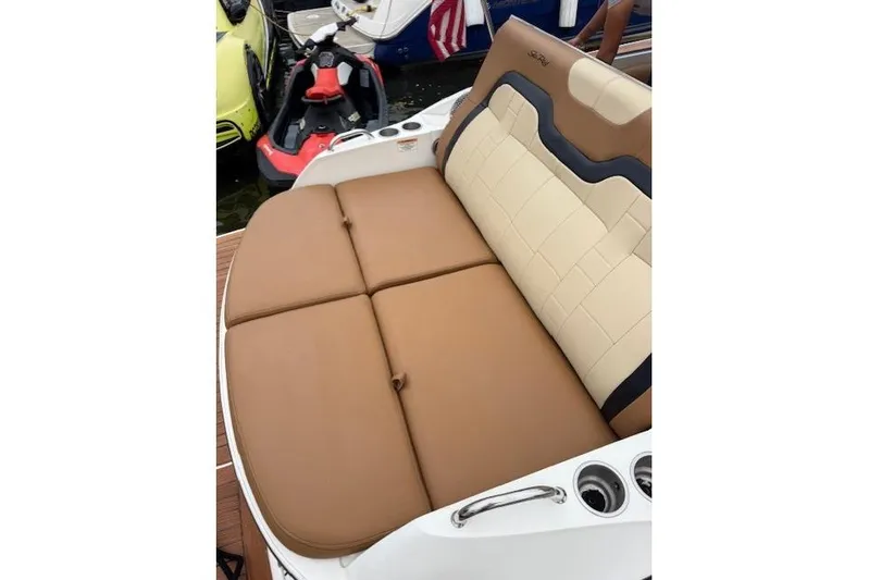  Yacht Photos Pics Luxurious seating on a 2015 Sea Ray 350 SLX boat, featuring tan and cream upholstery.