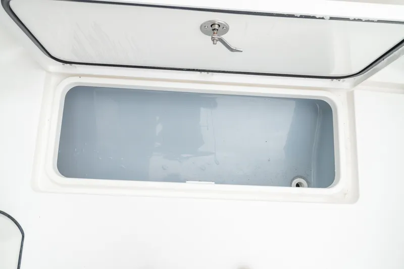  Yacht Photos Pics Open storage compartment on 2026 Crevalle 33 CSF boat.
