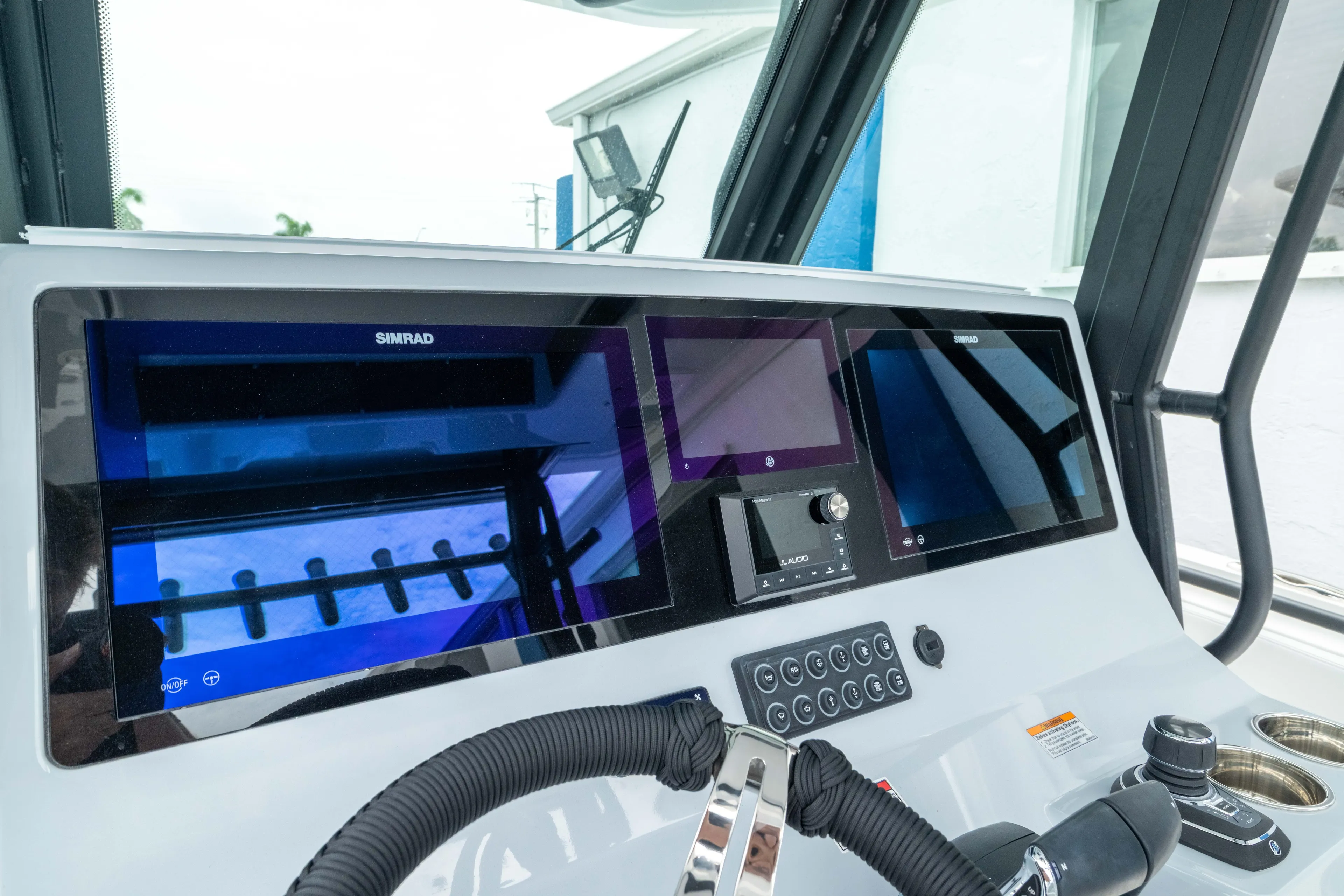  Yacht Photos Pics 2026 Crevalle 33 CSF boat dashboard with advanced navigation displays and controls.