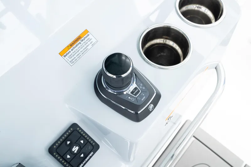  Yacht Photos Pics 2026 Crevalle 33 CSF boat console with controls and cup holders.