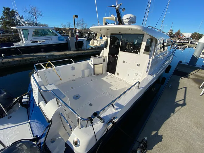  Yacht Photos Pics Aspen C107 2019 model boat docked at marina, featuring spacious deck and modern design.
