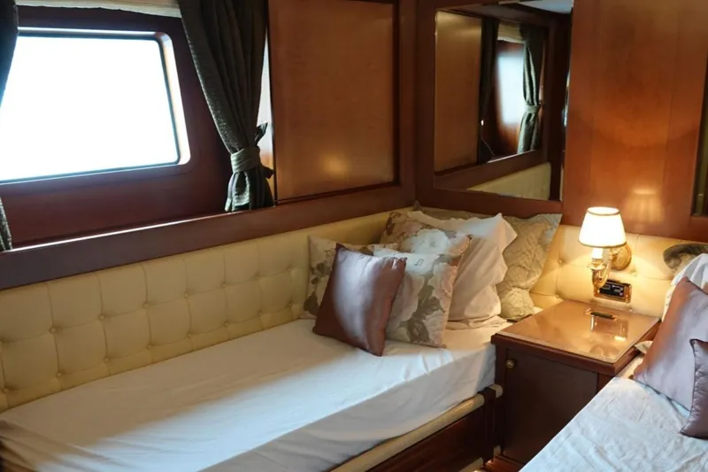 Sea Bear Yacht Photos Pics Luxurious cabin interior of 2013 Benetti Delfino 93 yacht with elegant bedding and lighting.