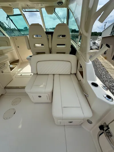  Yacht Photos Pics 2025 Grady-White 345 boat interior with plush seating and modern design.