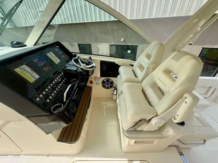  Yacht Photos Pics 2025 Grady-White 345 boat interior with dual helm seats and advanced navigation system.
