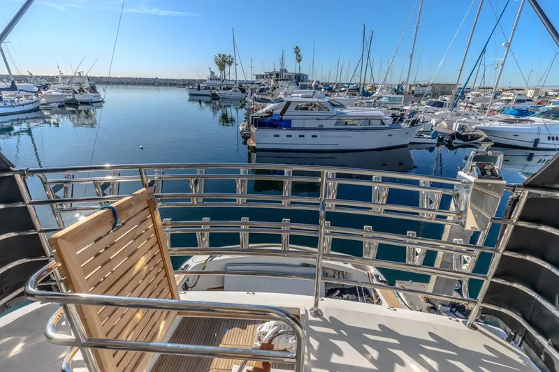 Kolohe Yacht Photos Pics View from 1993 Ocean 65 Custom yacht overlooking marina with multiple boats docked.