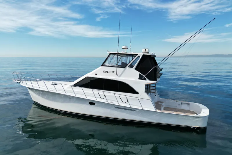 Kolohe Yacht Photos Pics 1993 Ocean 65 Custom yacht on calm sea under blue sky.