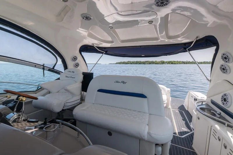  Yacht Photos Pics 2005 Sea Ray 420 Sundancer interior with luxurious seating and scenic water view.