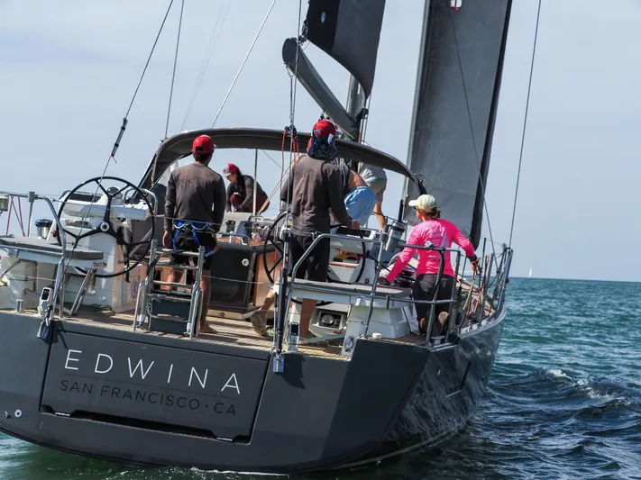 Edwina Yacht Photos Pics Sailing yacht Jeanneau 54, 2018 model, with crew on deck, named "Edwina," San Francisco.