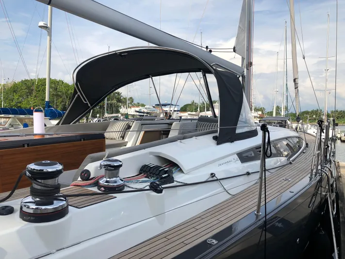 Edwina Yacht Photos Pics 2018 Jeanneau 54 yacht docked at marina, featuring sleek design and modern amenities.