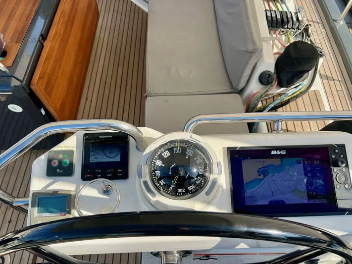 Edwina Yacht Photos Pics Helm of 2018 Jeanneau 54 sailboat with navigation instruments and compass.