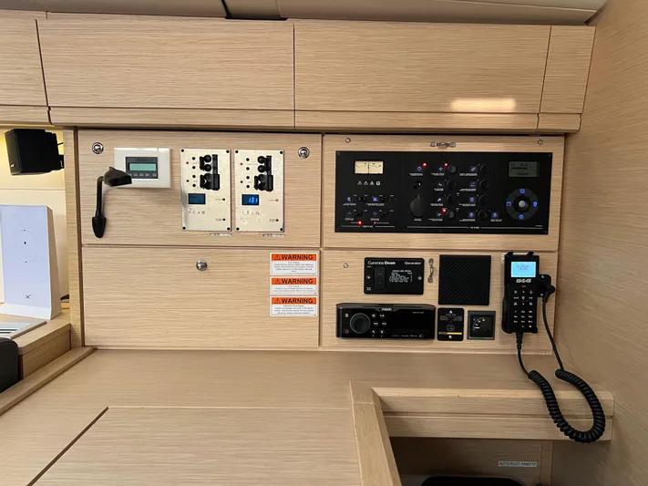Edwina Yacht Photos Pics Control panel of a 2018 Jeanneau 54 yacht, featuring navigation and communication equipment.