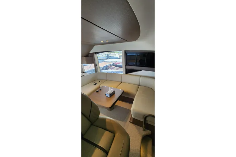  Yacht Photos Pics Luxurious interior of 2022 Princess F50 yacht with elegant seating and modern design.