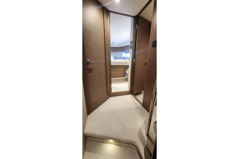  Yacht Photos Pics Interior view of 2022 Princess F50 yacht, featuring elegant wood finishes and modern design.