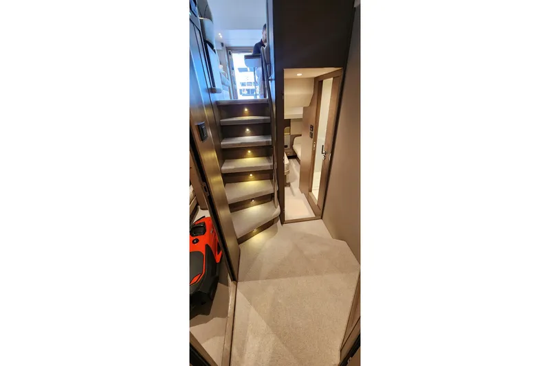  Yacht Photos Pics Interior of 2022 Princess F50 yacht with illuminated stairs and modern design.