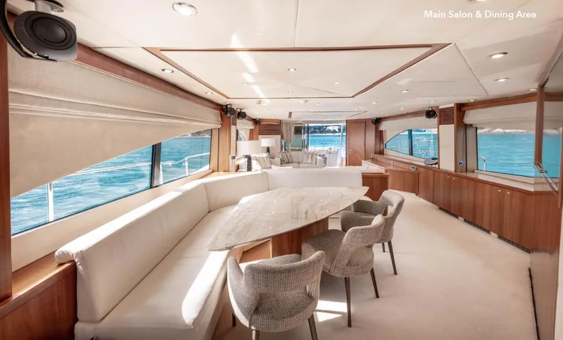  Yacht Photos Pics Luxurious interior of 2007 Sunseeker 90 Yacht with elegant dining area and ocean view.