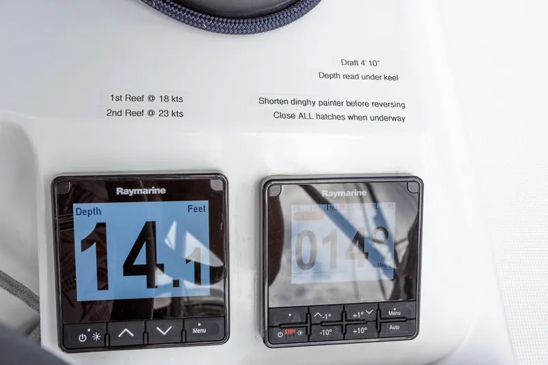 Off The Clock Yacht Photos Pics Raymarine depth displays on Jeanneau Sun Odyssey 349, 2020 model, showing 14.1 feet.