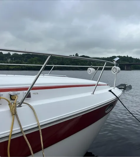  Yacht Photos Pics 2006 Rinker 390 Express Cruiser docked on a cloudy day.
