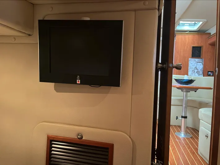  Yacht Photos Pics Flat-screen TV in the cabin of a 2006 Rinker 390 Express Cruiser yacht.