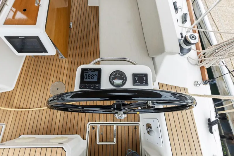 Dotwick Jinga Yacht Photos Pics Steering wheel and controls on a 2020 Dufour 360 sailboat deck.