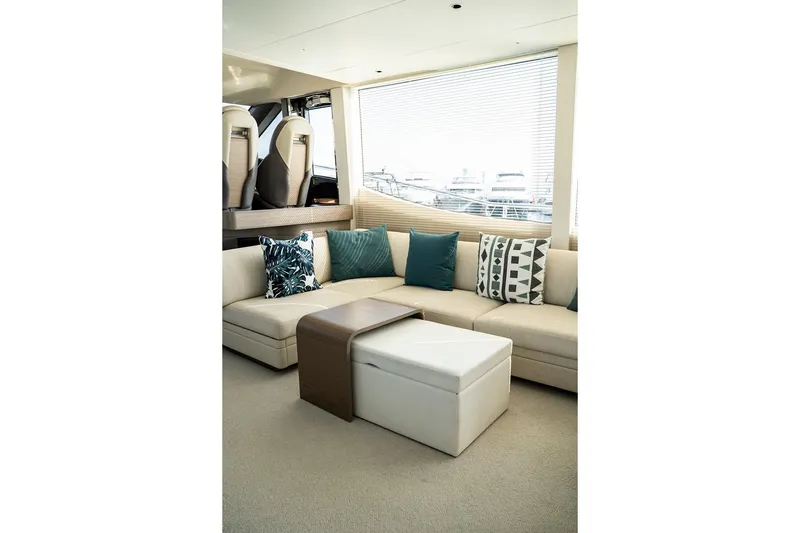  Yacht Photos Pics Luxurious interior of 2023 Princess Y72 yacht with elegant seating and decorative cushions.