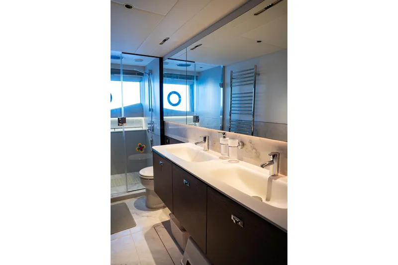  Yacht Photos Pics Luxurious bathroom in 2023 Princess Y72 yacht with dual sinks and modern fixtures.
