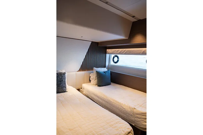  Yacht Photos Pics Luxurious twin cabin interior of 2023 Princess Y72 yacht with modern decor.