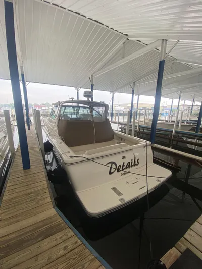 Details Yacht Photos Pics 1998 Tiara Yachts 35 Open docked under covered marina.