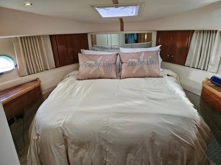 My Girls Too Yacht Photos Pics Luxurious bedroom in 1998 Viking Princess 46 Flybridge Sport Cruiser yacht.