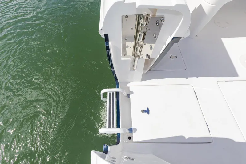  Yacht Photos Pics Manufacturer Provided Image: 2022 Intrepid 345 Nomad FE boat deck with water view.