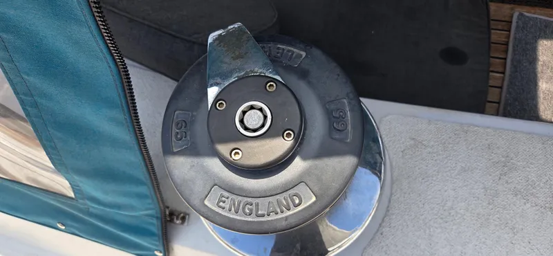  Yacht Photos Pics Winch on 1987 Tayana Center Cockpit sailboat, marked "England" and "65".