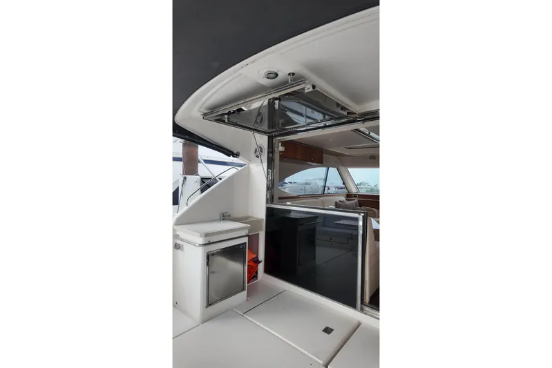  Yacht Photos Pics 2009 Riviera 4700 Sport Yacht interior with sleek design and modern amenities.