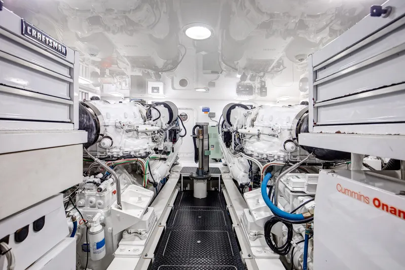 Pipe Dreamer Yacht Photos Pics Engine room of 2015 Viking 70 Convertible yacht with Craftsman toolboxes and Cummins Onan generator.