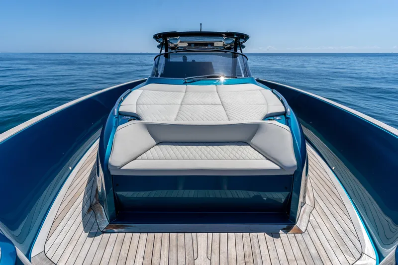  Yacht Photos Pics 2024 Solaris Power 52 Open yacht with sleek design and luxurious deck on open sea.