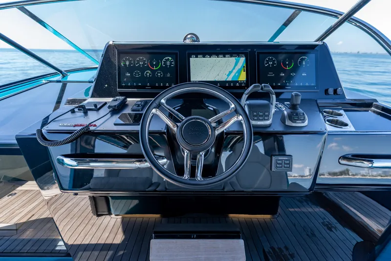  Yacht Photos Pics 2024 Solaris Power 52 Open yacht dashboard with modern navigation and control systems.