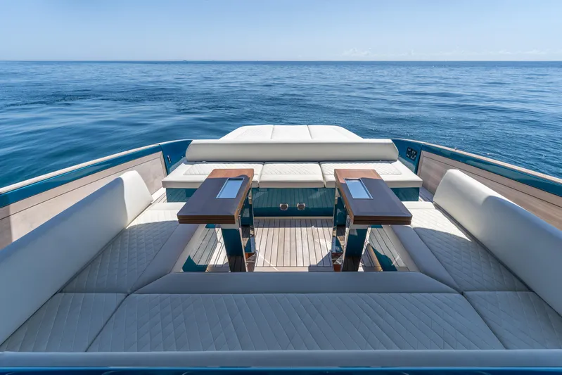  Yacht Photos Pics Luxurious 2024 Solaris Power 52 Open yacht with elegant seating and ocean view.