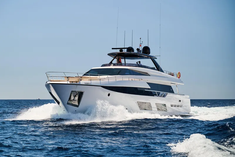  Yacht Photos Pics 2023 Ferretti Yachts 920 cruising on open sea under clear blue sky.