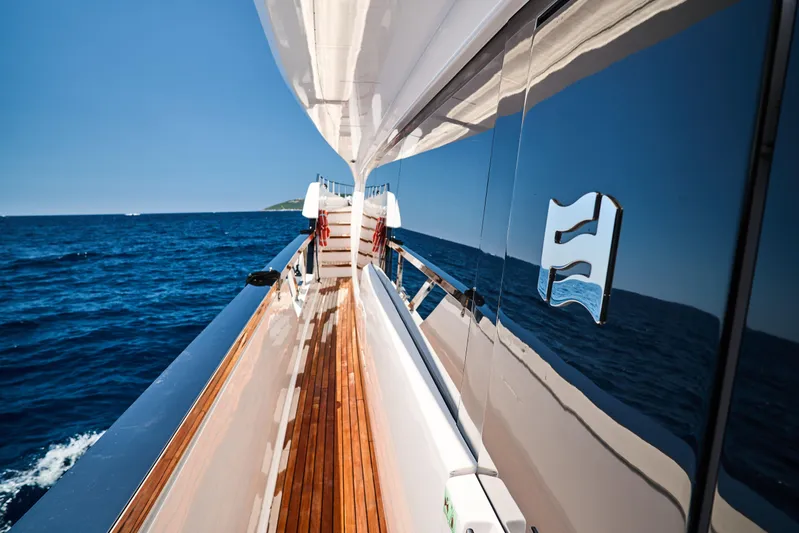  Yacht Photos Pics 2023 Ferretti Yachts 920 cruising on open sea, showcasing sleek design and luxury.