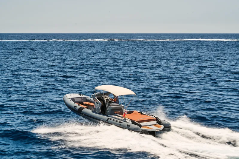  Yacht Photos Pics 2023 Ferretti Yachts 920 cruising on open sea under clear sky.