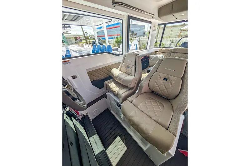  Yacht Photos Pics 2024 Axopar 37XC CROSS CABIN BRABUS interior with luxurious seating and modern design.
