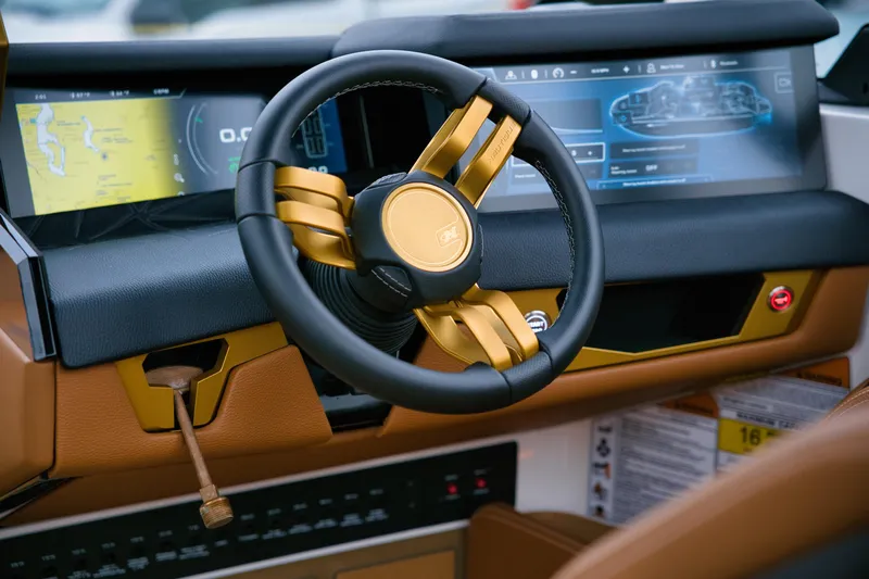  Yacht Photos Pics 2024 Nautique Super Air Nautique G23 Paragon dashboard with advanced controls and sleek design.