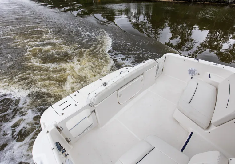 Forever Friday Yacht Photos Pics 2005 Tiara Yachts 3600 Sovran cruising on calm waters, view of spacious deck.