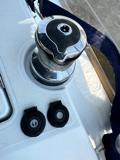 Lucky Yacht Photos Pics Winch and controls on 2014 Beneteau Oceanis 45 sailboat deck.